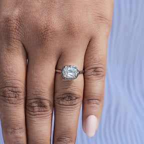 In hand showing view of moissanite Ring	 		