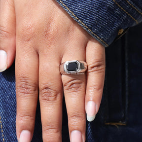 Close view of moissanite ring in secure setting 
