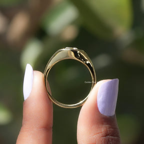 Back View of Old Mine Cushion Cut Moissanite Ring In two fingers