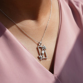 In neck front view of moissanite emerald cut pendant