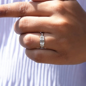 Colorless Emerald Cut Moissanite Ring In finger