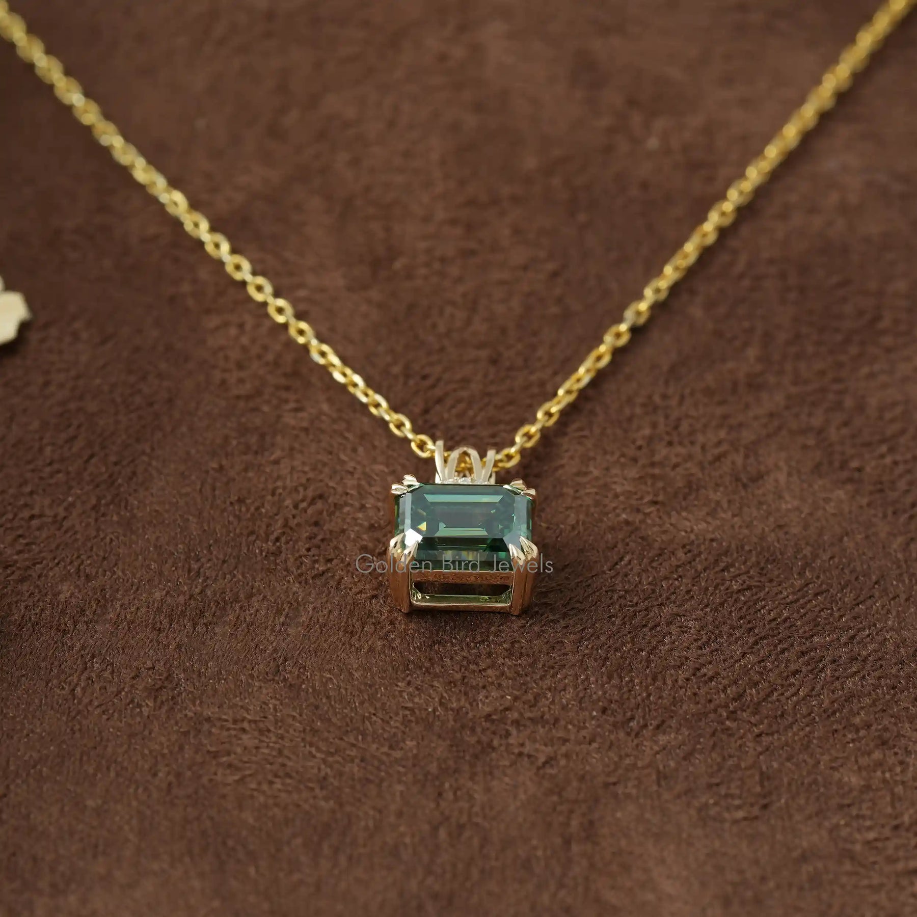 [Front view of moissanite emerald cut pendant in 14k yellow gold]-[Golden Bird Jewels]
