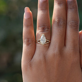 View of Solitaire Marquise Cut Moissanite Ring In Yellow Gold
