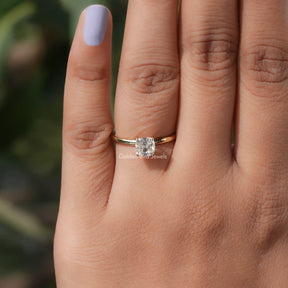 Detailed View Of Cushion Cut Solitaire Engagement Ring In Yellow Gold