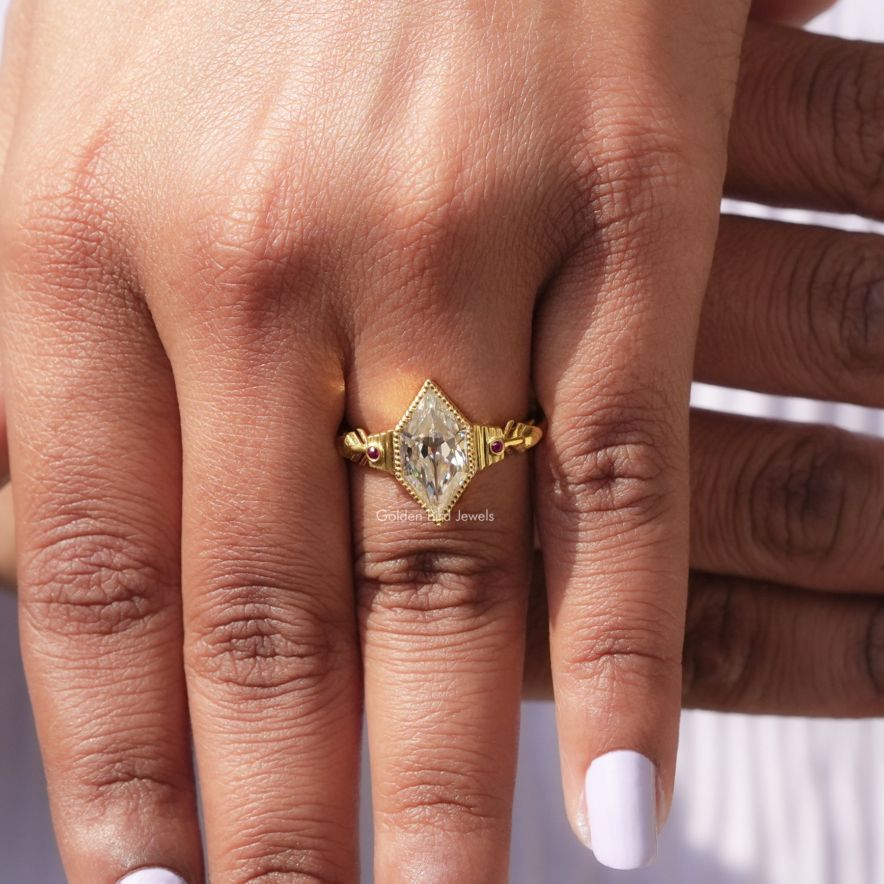[In finger front view of old mine dutch marquise cut moissanite engagement ring crafted with round cut side stones]-[Golden Bird Jewels]