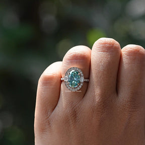 Close-Up View of Oval Cut Moissanite Halo Ring In Yellow Gold        