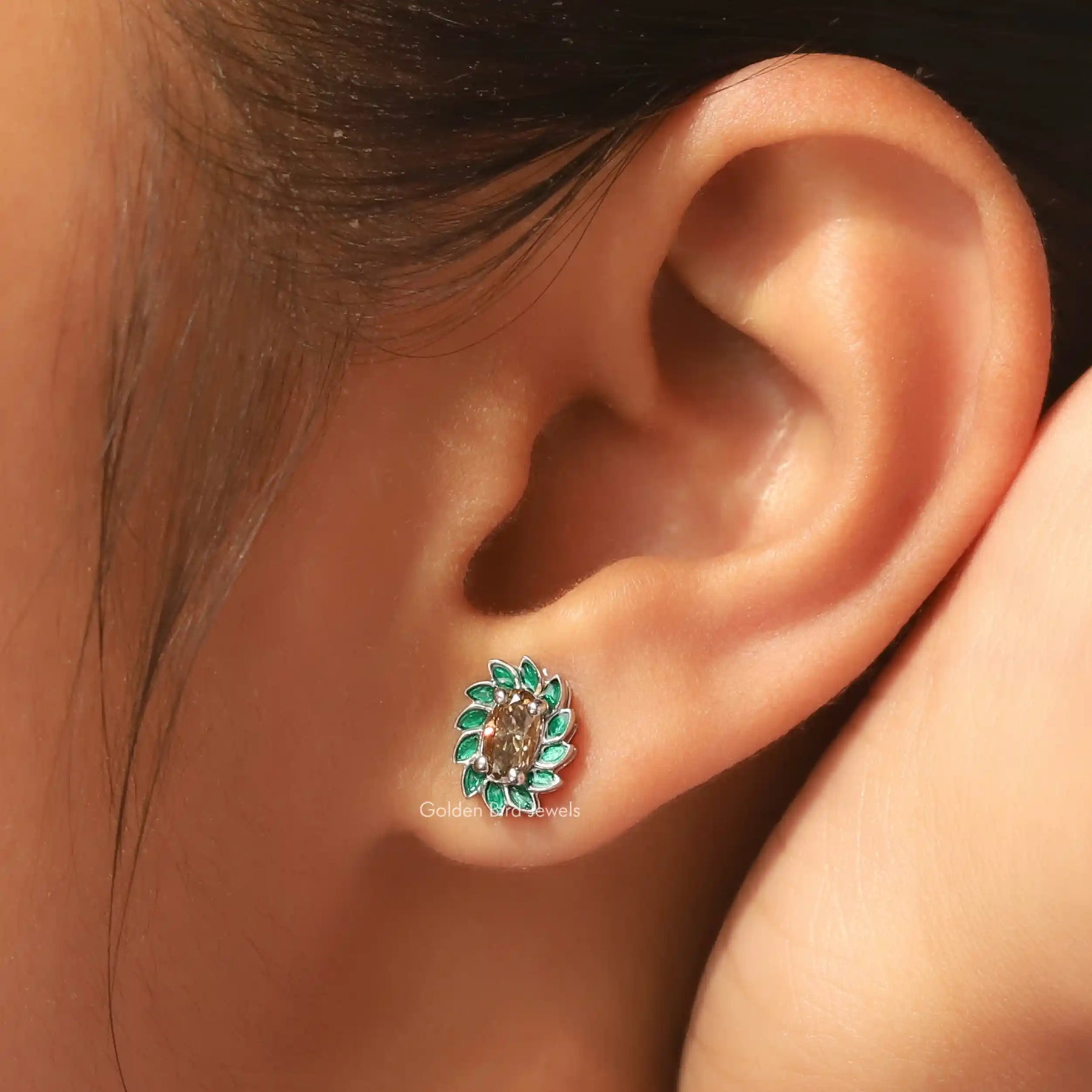 Detailed view of Oval Cut Floral Stud Earrings In Prong Setting