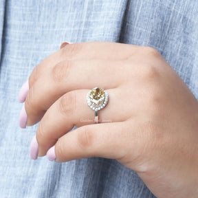 [In finger front view of old mine oval cut moissanite engagement ring]-[Golden Bird Jewels]