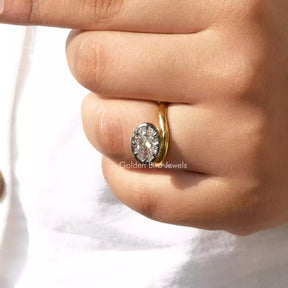 [In finger front view of off white oval cut moissanite ring]-[Golden Bird Jewels]