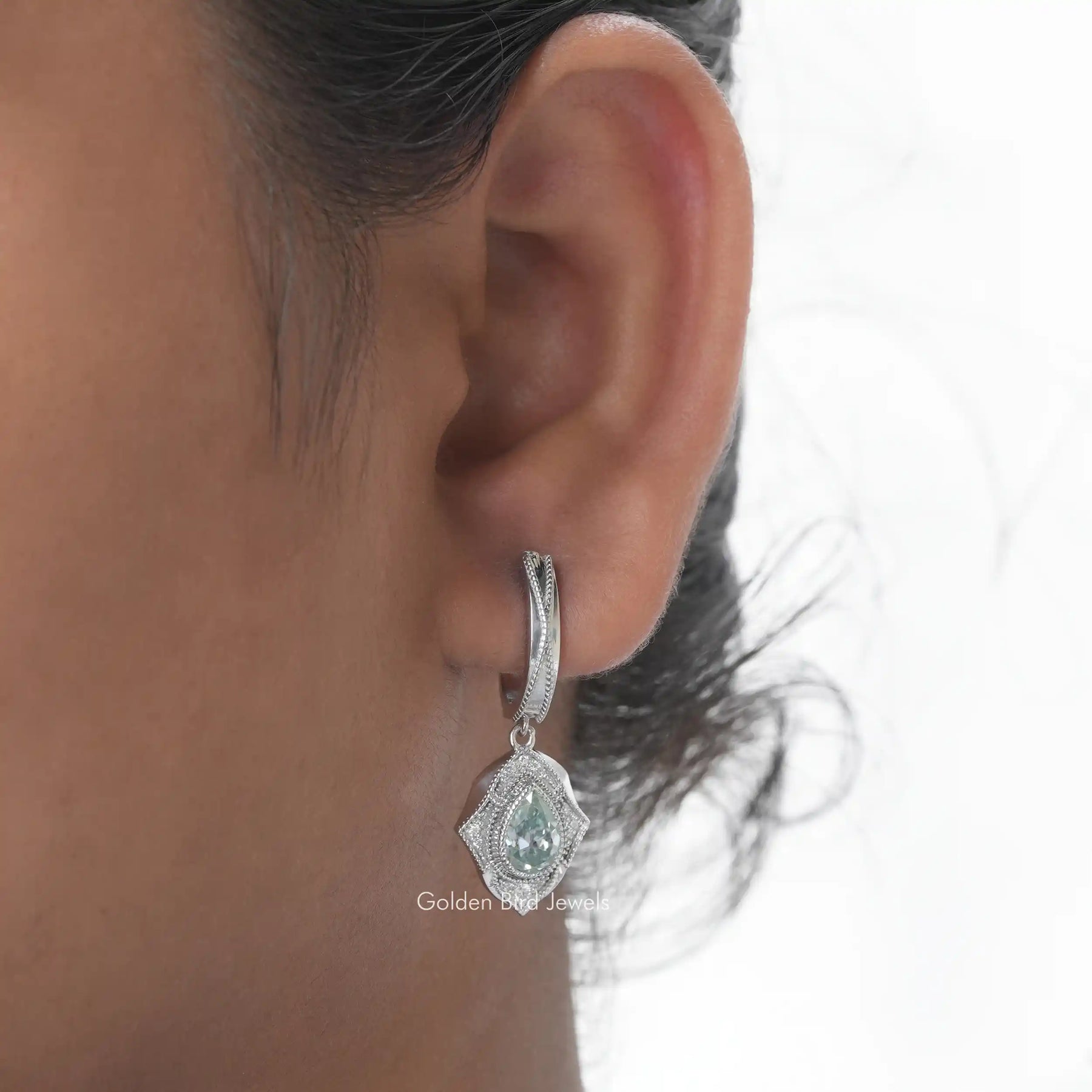 [In ear front view of dangle earrings maade of round cut side stones]-[Golden Bird Jewels]