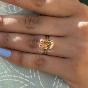 [In finger front view of moissanite solitaire wedding ring craftted with 14k yellow gold]-[Golden Bird  Jewels]