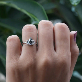[In Finger a Moissanite Cluster Style Engagement Ring  Made Of Pear Cut Stone]-[Golden Bird Jewels]