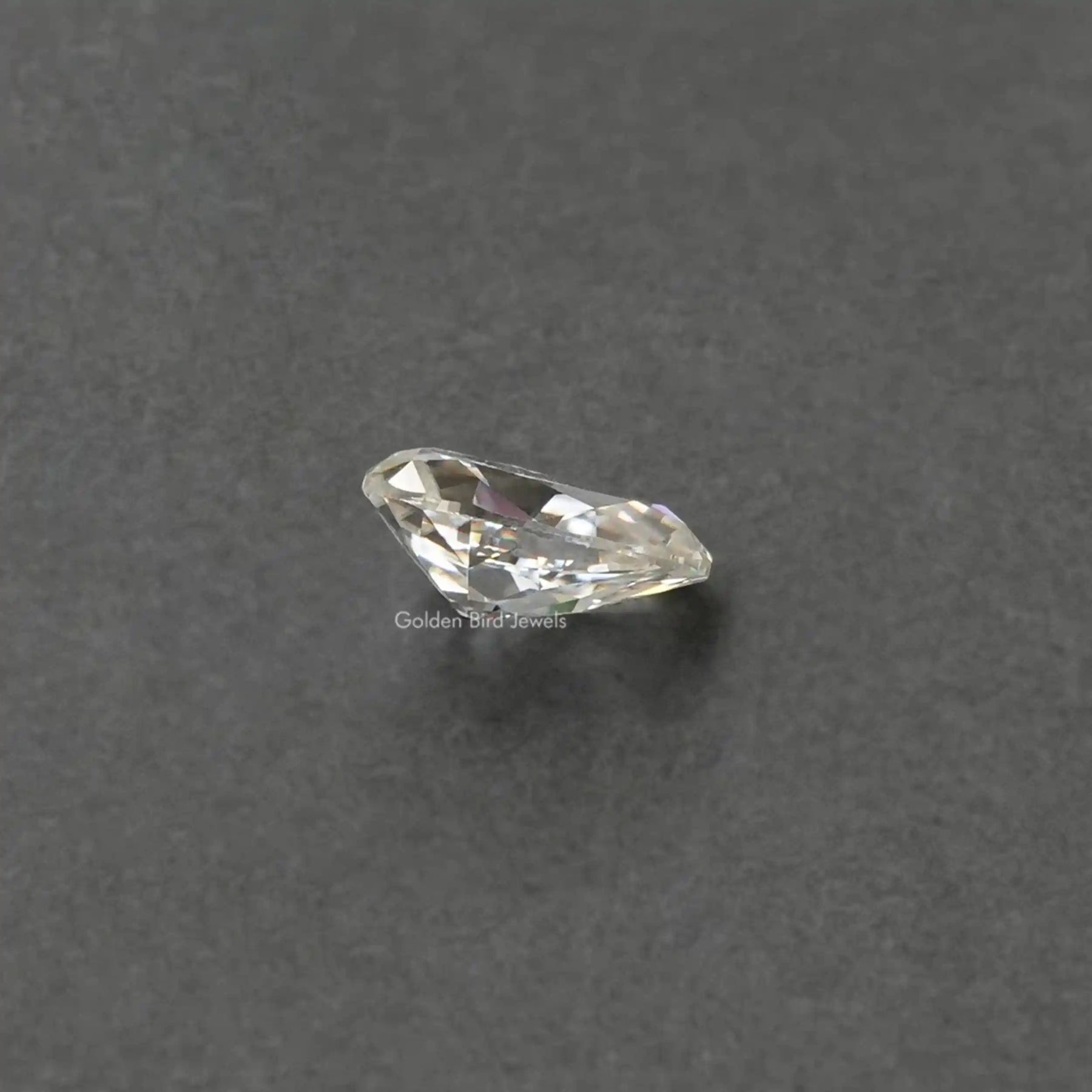 [Side view of moissanitee pear shaped loose stone made of VVS clarity]-[Golden Bird Jewels]