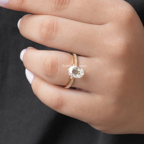 Close-Up View of Moissanite Portrait Hexagon Cut Halo Ring In Yellow Gold