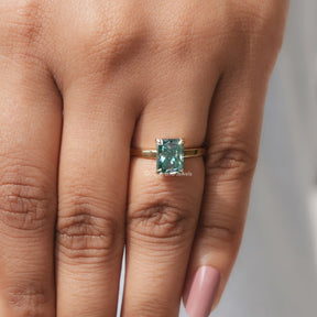 Close-Up View of Radiant Cut Solitaire Engagement Ring In Yellow Gold