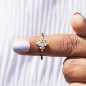 In finger front View of Marquise And Round Cut Moissanite Ring