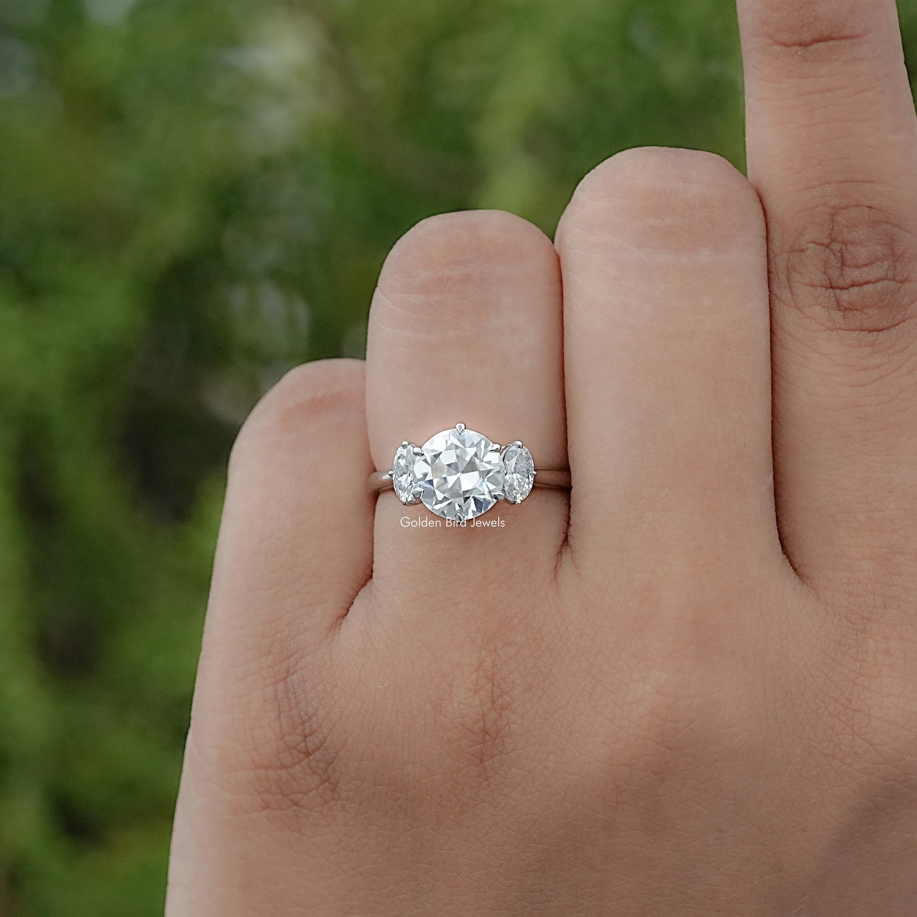 Old European Round And Oval Moissanite Three Stone Ring