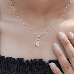 Side View Of Round And Pear Cut solitaire pendant