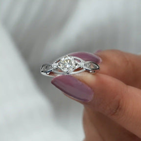[In finger front view of moissanite round cut anniversary ring]-[Golden Bird Jewels]