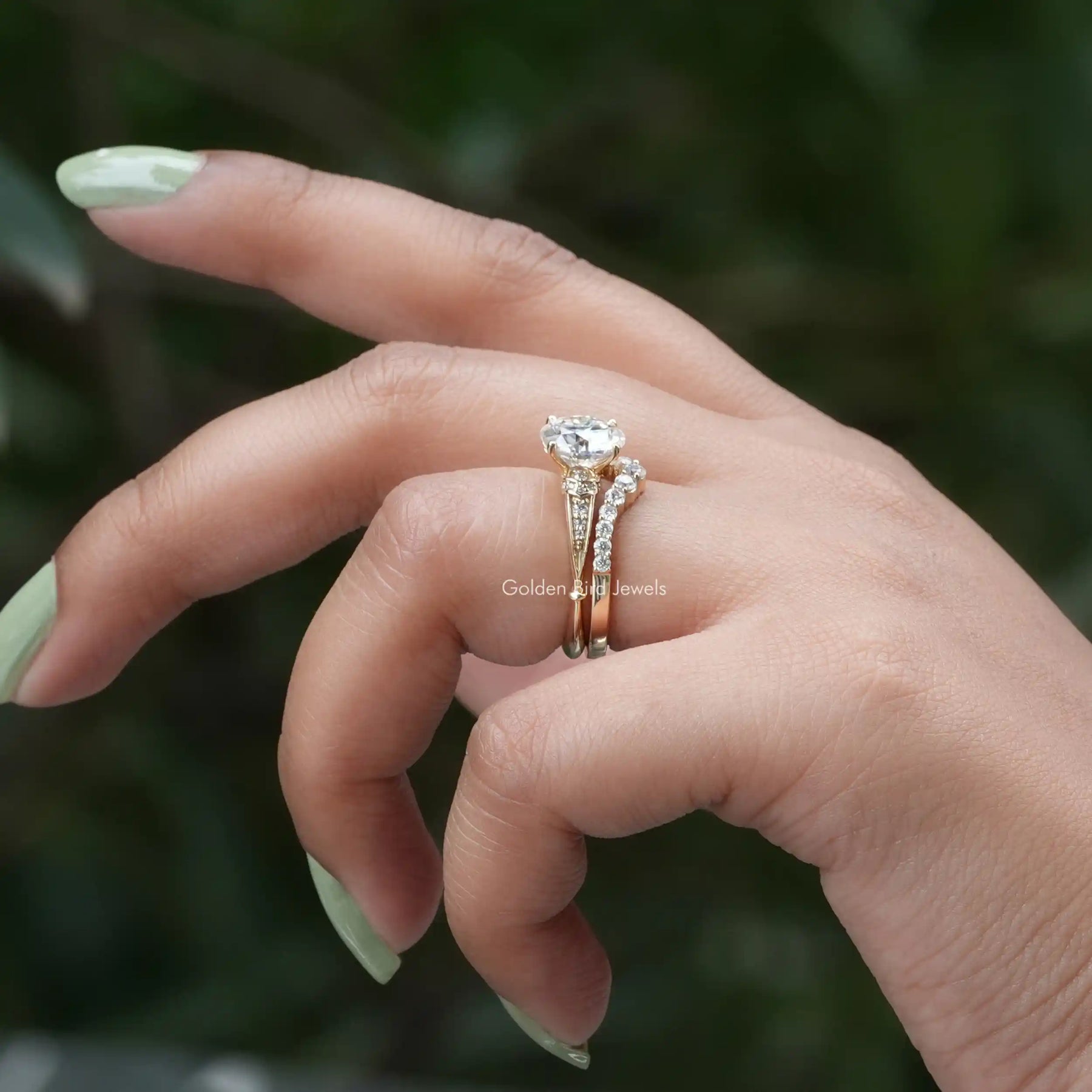 [In finger side view of moissanite round cut accent stone ring]-[Golden Bird Jewels]