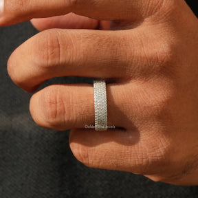 In hand showing a view of moissanite Ring	 		
