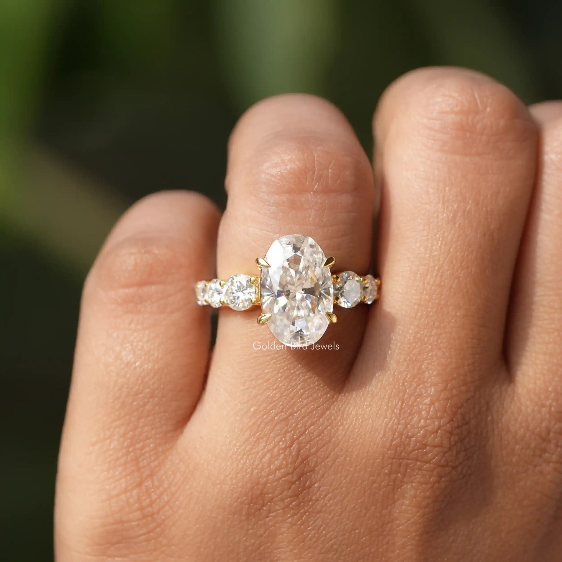 [In finer front view of oval cut moissanite ring set ring prog setting]-[Golden Bird Jewels]