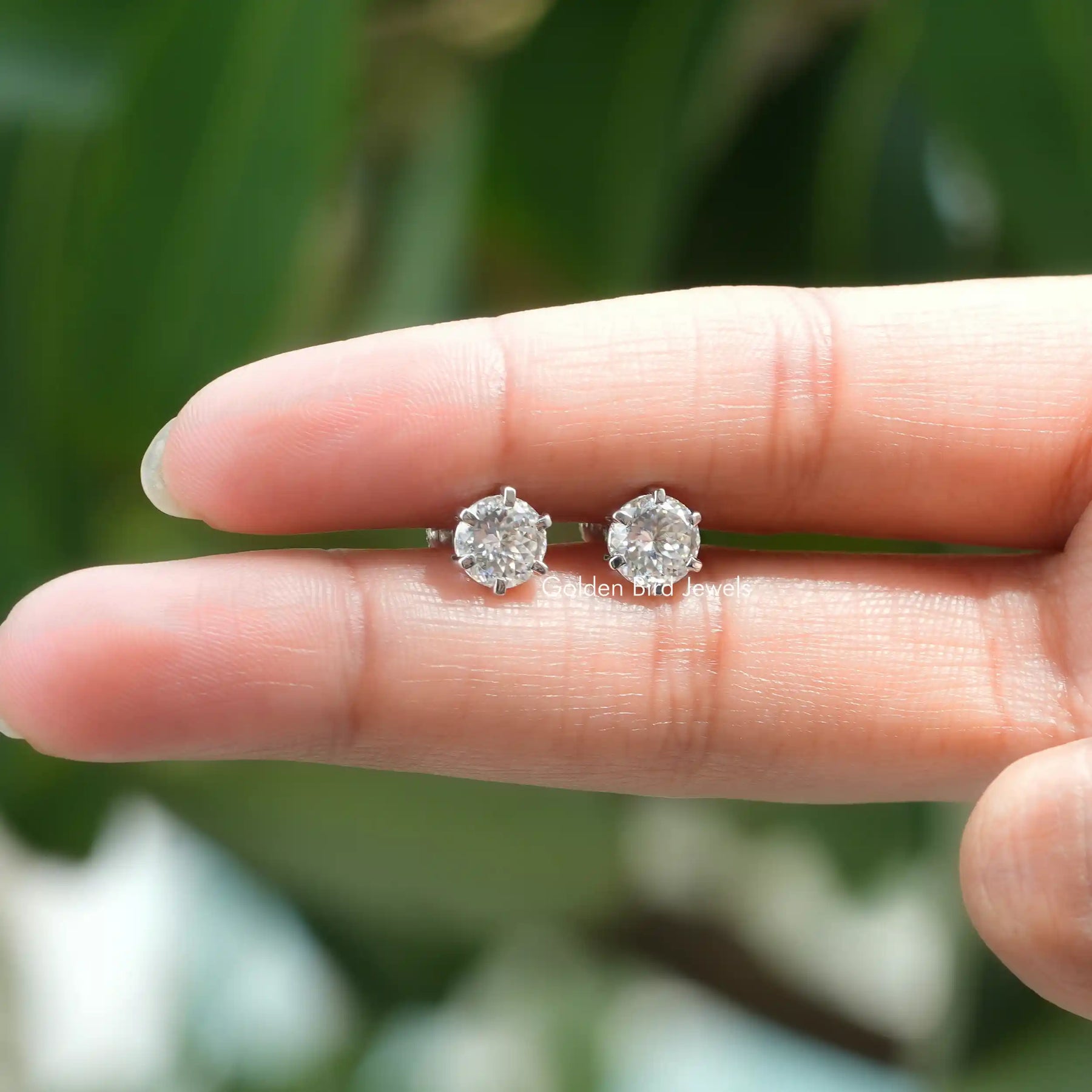 [Holding In Finger a Pair of 2.16 TCW Portuguese Moissanite Stud Earrings]-[Golden Bird Jewels]