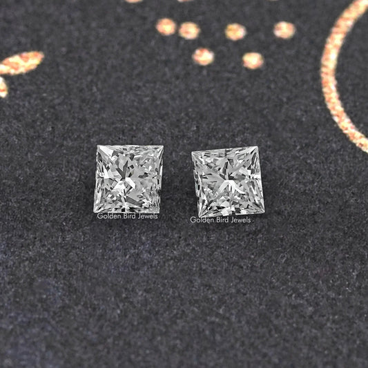 Close-up pair of princess-cut lab-grown diamonds, square stones with crisp facets