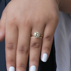 Round Cut Solitaire Moissanite Ring In Yellow Gold