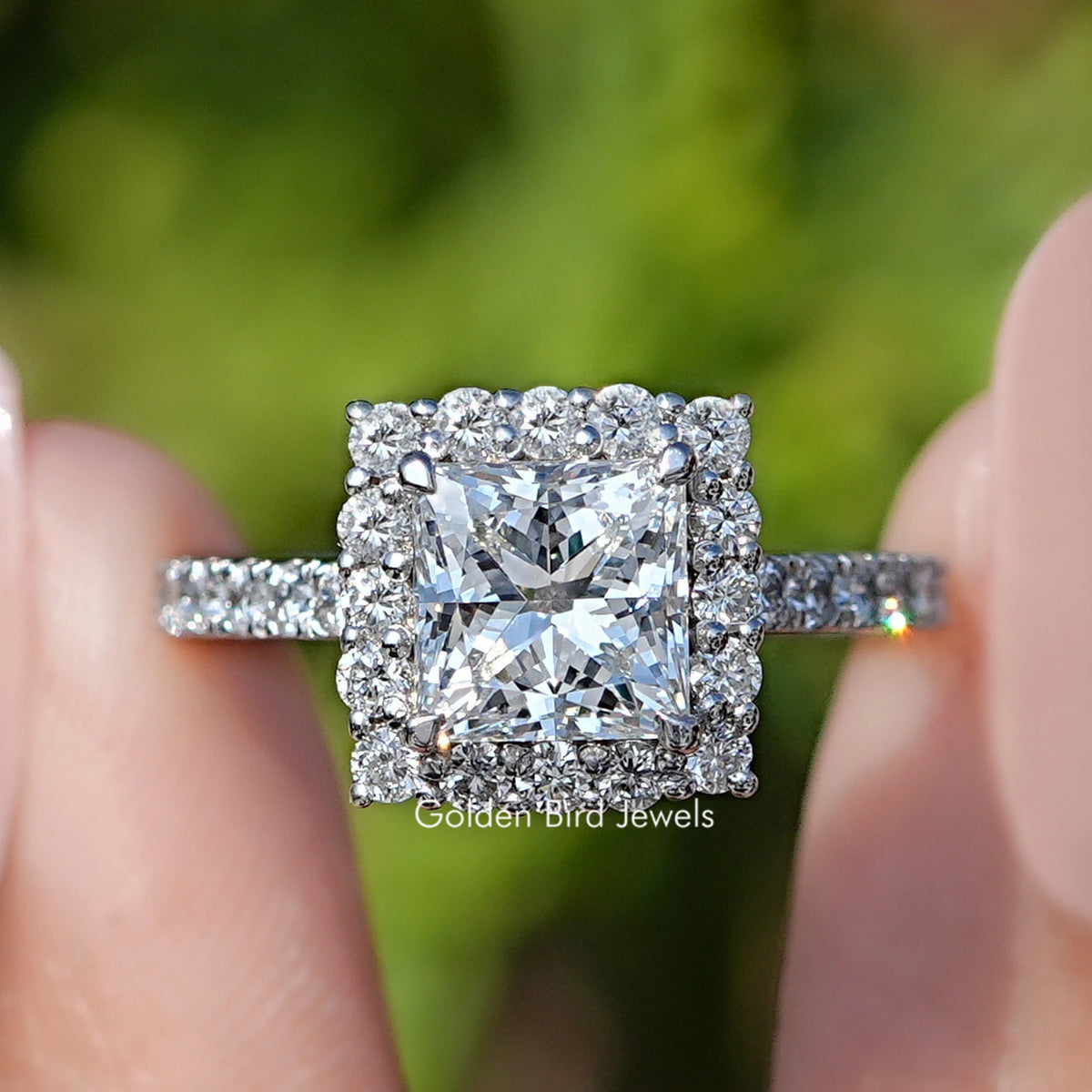 Front view of Princess Cut Lab Diamond Halo Accent Ring in two fingers 