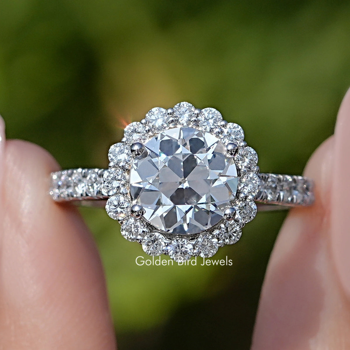 Front view of Old European Round Lab Diamond Halo Accent Ring in two fingers 