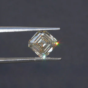 Tweezer holding the Asscher Cut Loose Moissanite Stone
