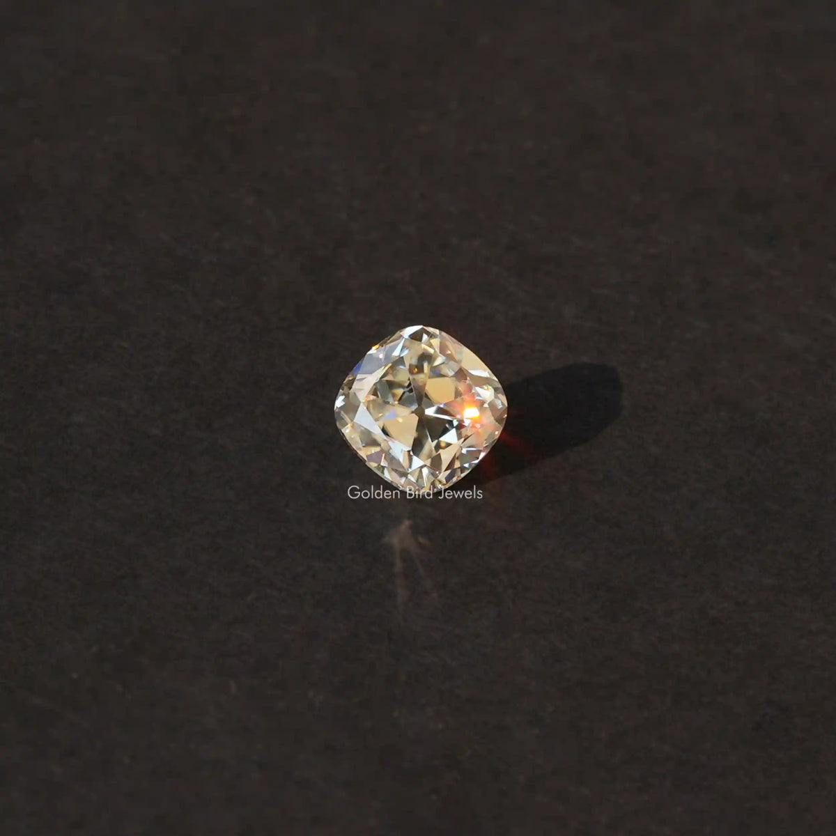 [Front view of off white old mine cushion loose moissanite]-[Golden Bird Jewels]