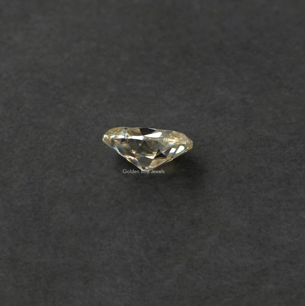 [Side view of off white old mine oval cut moissanite crafted with VVS clarity]-[Golden Bird Jewels]