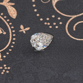 Off White Old Mine Pear Loose Moissanite
