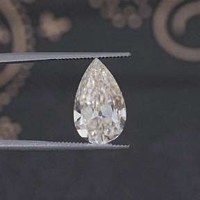 Off White Old Mine Pear Loose Moissanite