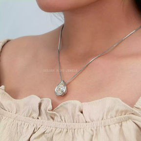 [In neck side view of old mine pear cut moissanite pendant made of 14k white gold]-[Golden Bird Jewels]