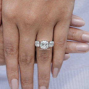 Top view of Old Mine Cushion Three Stone Moissanite Ring for women 's wear
