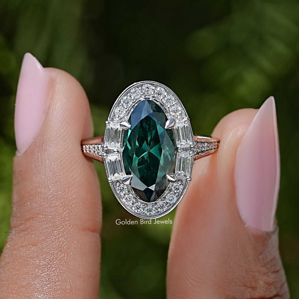 Dark green Old Mine Moval moissanite halo ring with white baguette moissanite and lab-grown diamond accents