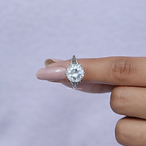 In finger front View of Round Moissanite Engagement Ring In White Gold