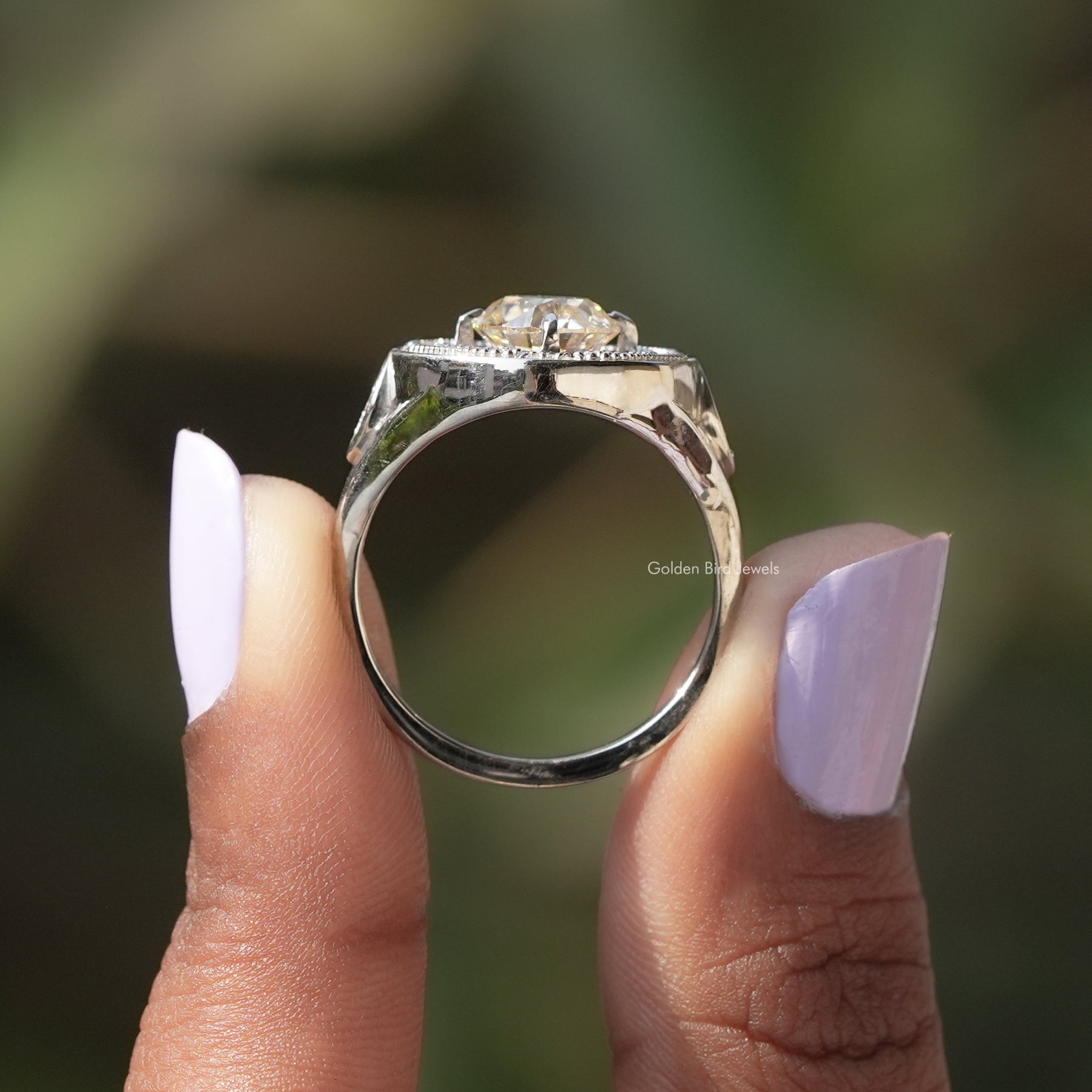 [In two finger side view of old european round cut and tapper baguette cut halo ring made of 14k white gold]-[Golden Bird Jewels]