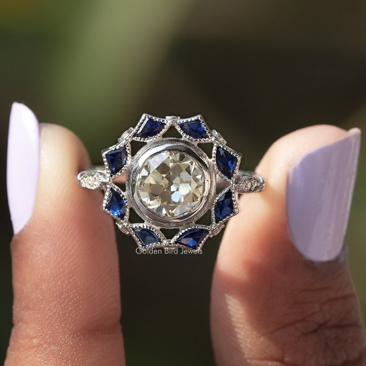 [In two finger front view of old european round cut bezel setting moissanite ring]-[Golden Bird Jewels]