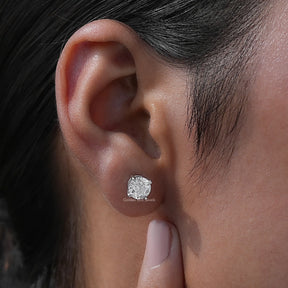  In-ear view of White Gold Old Europan Round Cut Studs 