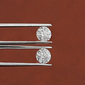 Twijer hold on Old European Round Cut Diamond