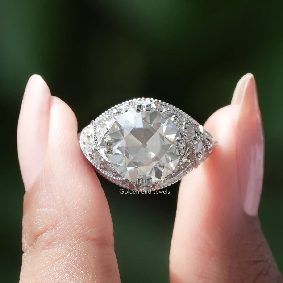 Front View of Old European Round Cut Moissanite Art Deco Ring In two Fingers