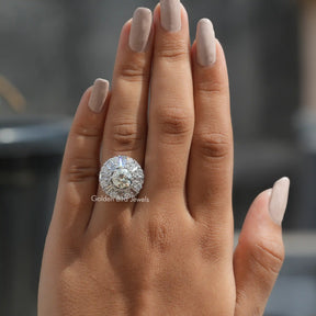 [In finger front view of moissanite round cut stone with side stones]-[Golden Bird Jewels]