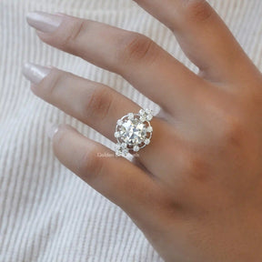 [Cross finger front view of of old european round cut moissanite ring]