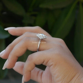 [Slightly folded finger view of old european round cut moissanite ring]