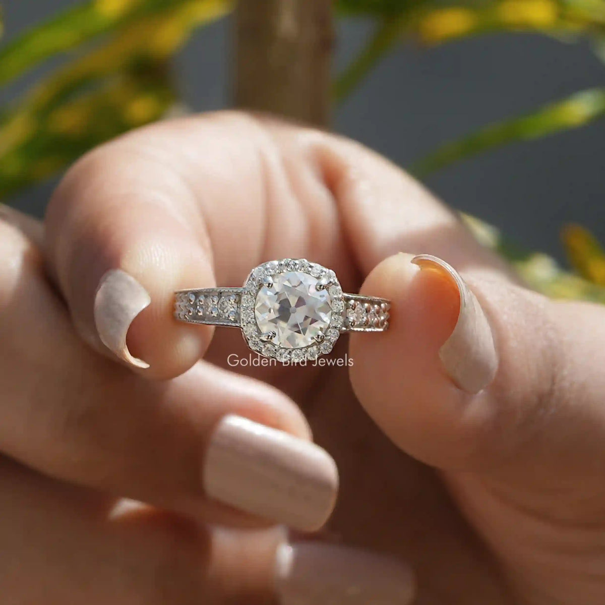 Front View of Old European Round Cut Halo Moissanite Vintage Ring In two Fingers