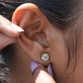 Close view of Light Yellow Round Cut Moissanite Studs
